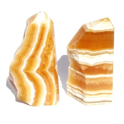 China Natural Calcite Orange Slices From Europe Crystal Yellow Honey Iceland Spar For Healing for sale