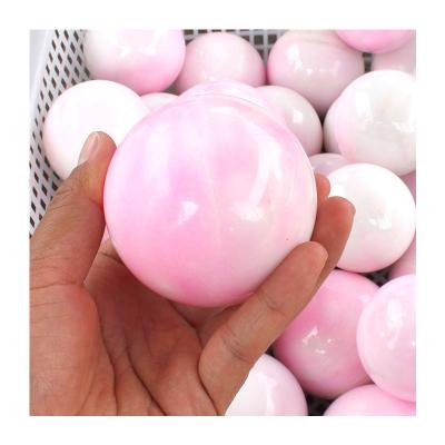 China Europe Wholesale Polished Aragonite Passionate Crystal Ball For Home Decoration Natural Stone Sphere for sale