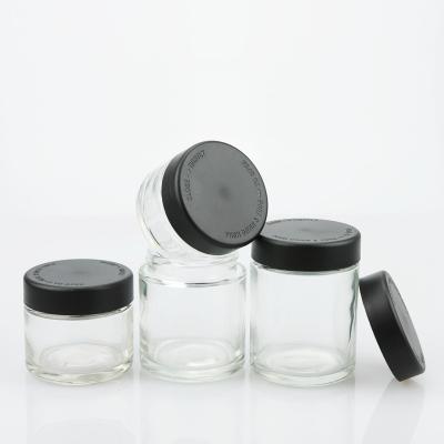 China 1oz 2oz 3oz 4oz Packing Glass Jar With Cr Plastic Black Lid for sale