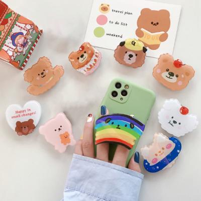 China Adjustable Creative Cartoon Glue Bear Airbag Mobile Phone Drip Lazy Desktop Telescopic Bracket for sale