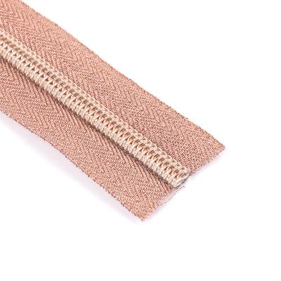 China NEW Gold Color Light Teeth Zippers #5 Nylon Long Chain Zippers Tape For Clothes for sale