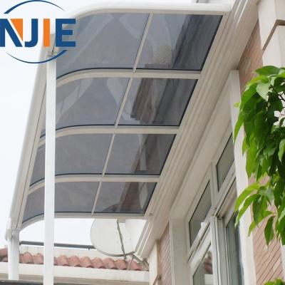 China Door Factory Price Patio Awnings Canopy for Home with Aluminum Frame and Waterproof Polycarbonate Roof for sale