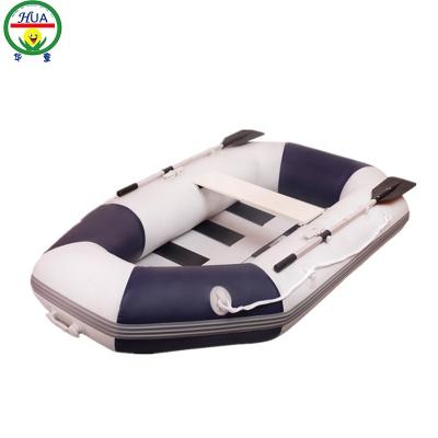 China Hot Sale Portable Inflatable Cheap Price Inflatable Rowing Boat Ocean Kayak Fishing Canoe Rowing Boat With Paddle For Sale for sale