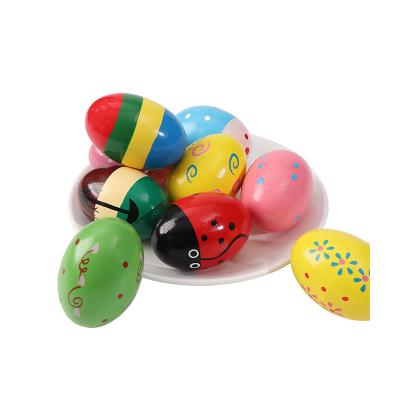 China Toy Musical Instrument Hammer Sand Music Eggs Baby Color Solid Wood Sand Egg Early Education Model for sale