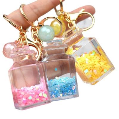 China 2023 New Color Feeding Bottle Drift Bottle Quicksand Fashionable Pendant Key Rings Liquid Key Chain Pendant Bag Accessories for sale