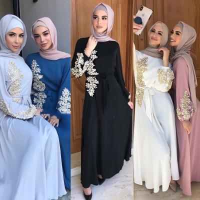 China Breathable Wholesale Ladies Lace Up Long Robe Loose Beaded Arabic Muslim Dress Long Robe Islamic Clothing for sale