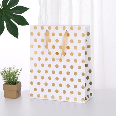 China Recyclable Wholesale Economical Good Design Coated Paper Bags Gift Bag White Paper Jewelry Bags for sale