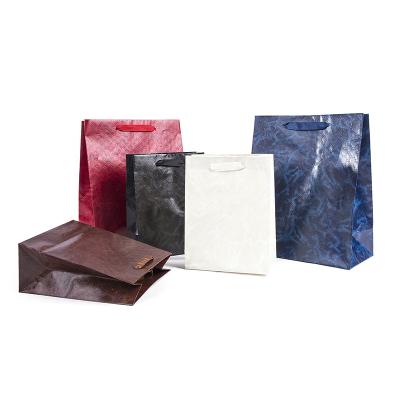 China Wholesale Custom Recyclable Luxury Shopping Gift Specialty Tote Bag RJTZ001-2 Paper Bag With Handle for sale