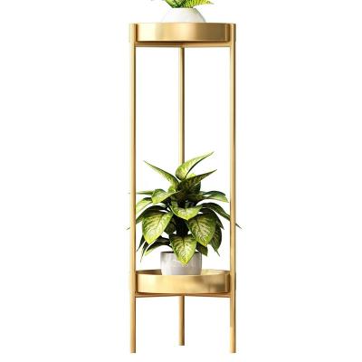 China Strong and Durable Modern Nordic Designs Iron Metal Gold Large Flower Stand Floor Potted Plants Stretch Plant Rack for Balcony Indoor Home Furniture for sale