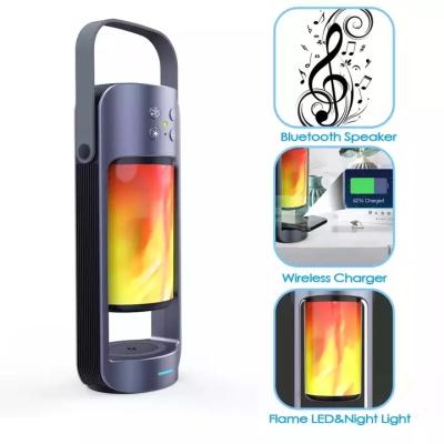 China Alpha Wireless Charging Flame Lamp Bluetooth Speaker Emergency Light Camping Lamp TWS Modern Outdoor Waterproof Tandem Night Light for sale