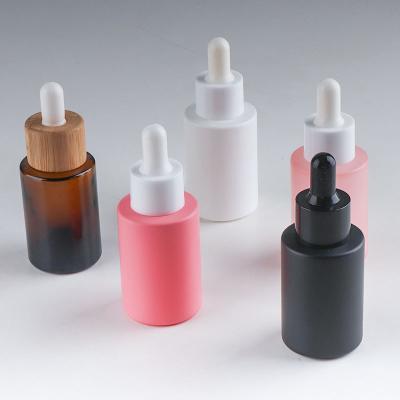 China Beautiful 1.01 oz Personal Care Glass Bottle 30ml Oil Dropper Essential Bottle With Plastic Dropper for sale