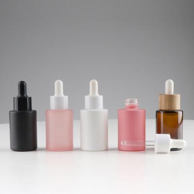 China Personal Care Logo Printing Bamboo Yellow Matte White Bottle Essential Oil 30ml Dropper Glass Bottle for sale