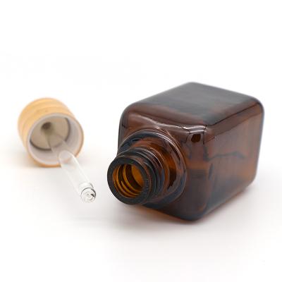 China 1Oz Amber or Custom Color 30ml 50ml 100ml Square Personal Care Bottle Glass Dropper Essential Oil Bottles Dropper Bottles for sale