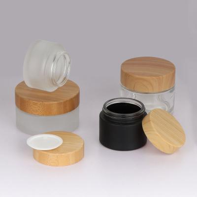 China 30g 50g 100g Personal Care 10g 15g Glass Face Clean Empty Cosmetic Container Frosted Cosmetic Cream Jars With Bamboo Lid for sale