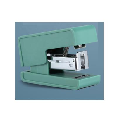 China Super Plastic And Metal Andstal Kawaii Green Binding Machine Effortless Stapler For School Supplies for sale