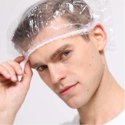 China Viable Custom Cheap Adults Salon Waterproof Clear Transparent Hotel Hair Cleaning Plastic Disposable Shower Caps for sale