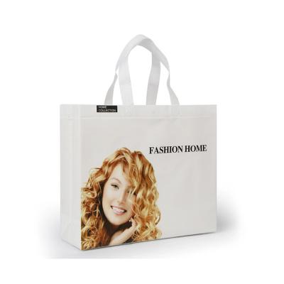 China Convenient Custom Design Logo Print Non Woven Laminated Gift Bag Custom Non Woven Bag Shopping for sale