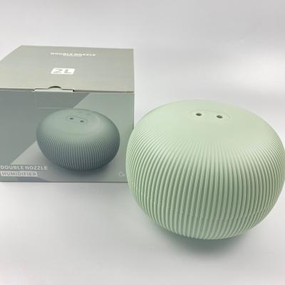 China Cheap RV 2L Double Nozzle Aroma Diffuser Humidifier For Bedroom for sale