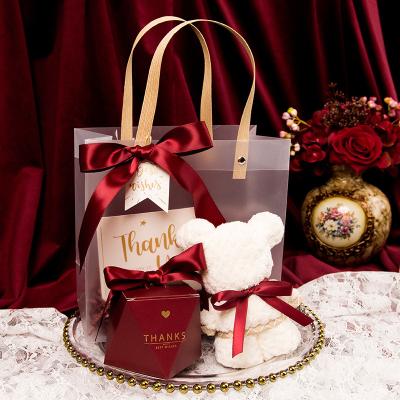 China New Design 2022 Recyclable Custom Red Wine Transparent Hand Frosted Wedding Gift Bag for sale