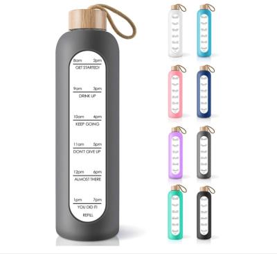 China Yeway Viable 32oz Borosilicate Glass Motivational Water Bottle Mug Time Marker With Bamboo Lid And Silicone Free Sleeve for sale