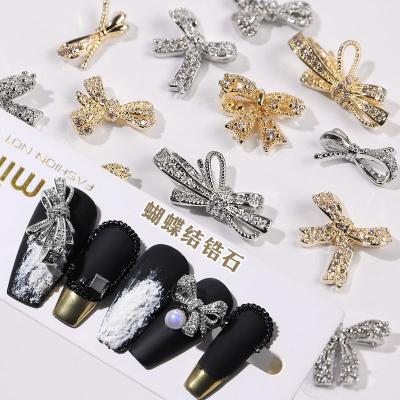 China Shiny 3D Zircon Butterfly Nail Art Gold Silver Bow Rhinestones Crystal Nail Art New Beauty Crystal For Nail Jewelry Charm Manicure Design Accessories for sale