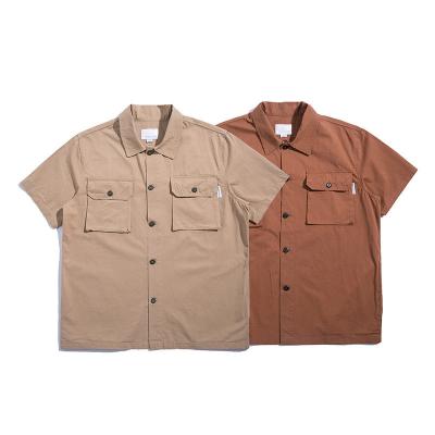 China New 2022 summer men's retro cargo short-sleeved cargo shirt double breasted pocket casual single breasted shirt for sale