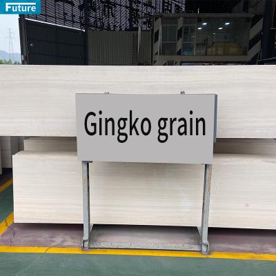 China Modern high quality chinese grain gingko natural stone marble slabs wooden for sale