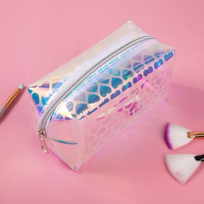 China Holographic transparent fashion small handmade zippered rainbow laser case hand zippered logo plastic PVC custom cosmetic bag for sale