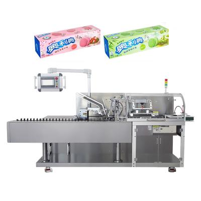 China Video Food Wrapping Cake Paper Maker Manual Strapping Bottle Automatic Packaging Machine For Package Box for sale