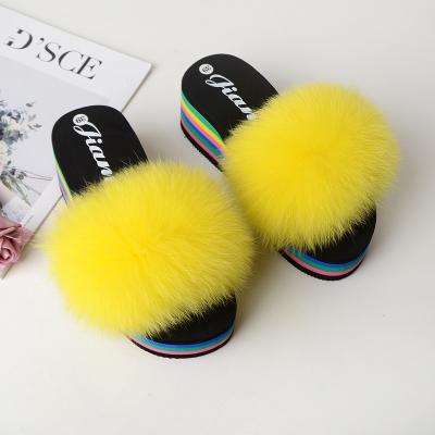 China New Style Handwoven Anti-skid Fluffy Rainbow Unique Slippers Summer Unique Slippers for sale