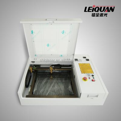 China Mini Laser Engraver CO2 4040 40W Laser Engraving LQ3020 4030 with Cheaper Price for sale