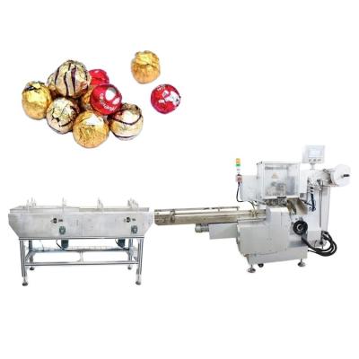 China 15-32mm Product Size Full Automatic Chocolate Wafer Ball Peanut Compound Packaging Machine for sale