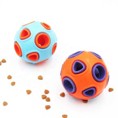 China Viable Interactive Treat Dog Toys Squeaky Durable Rubber Dispensing Ball Dog Chew Toys Ball With Small Bell for sale