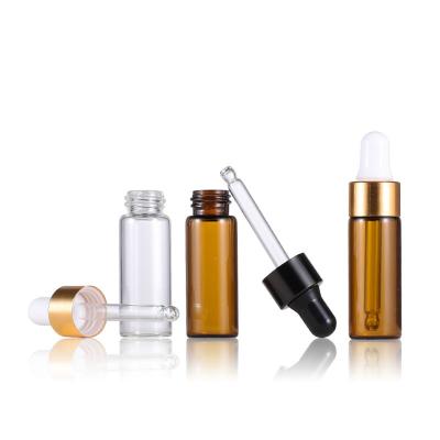 China Personal Skin Care Packaging Small Brown Amber Essential Oil Bottle Essence Bottle Glass Essential Oil Dropper Bottle for sale