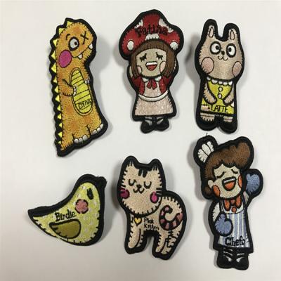 China Custom Cute Japanese Doll Embroidered Chapter Dinosaur Animal Doll Viable Cartoon Doll Apparel Embroidery Patch Doll Charm Custom Made for sale