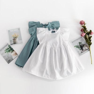 China Newborn Plain Anti-wrinkle Plain Baby Cotton Canvas Ruffle Dresses Summer Princess Dress for sale