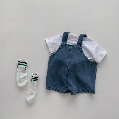 China 2023 Breathable Boys Girls Suit Baby Clothes Kids Denim Suspenders T-shirt 2pcs White Stylish Western Style for sale