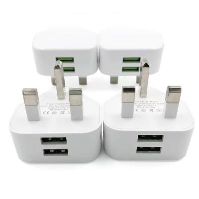 China UK 2021 New Mobile Phone Charger 2 USB Wall Charger Fast Charging Android Charger For iPhone 3.1A for sale