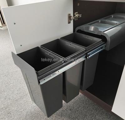 China Stored Recycling Soft Closing Under Sink Plastic Sliding Waste Bin for sale