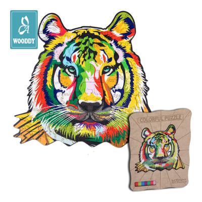 China DIY PLAY A4 Size 152 Pcs Wood Puzzles Best Gift For Adults And Kids Unique Shape Tiger Wooden 3D Puzzles for sale