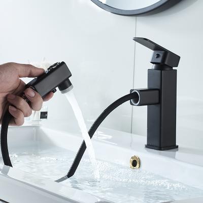 China Metered Faucets Black Pull Out Telescopic Single Hole Basin Tap Hot And Cold Stepped Faucet for sale