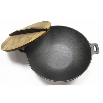 China Sustainable Chinese Kitchen Cookware 24cm Pre-Seasoned Cast Iron Wok With Lid for sale