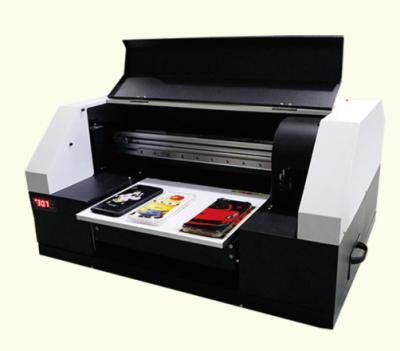 China Mini Digital UV Flatbed Printer A4 6090 Indoor Outdoor Advertising UV Printer for sale