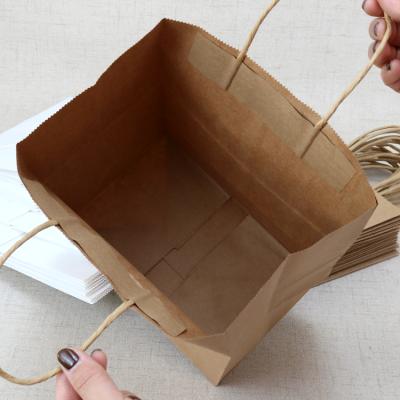 China Recyclable Wholesale Cheap Paper Bag Tote Paper Shopping Bag To Go Printing for sale