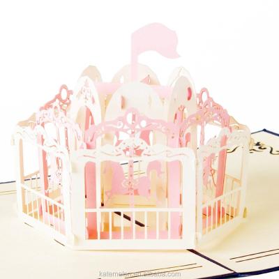 China Europe Kirigami Handmade Gifts 3D Greeting Card Merry Vanish Round Amusement Park Carousel Pop Up Card for sale