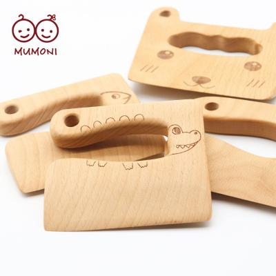 China We can make different patterns on the product customized kids cutting safe toys popular style wooden cutting tools and high quality kids knives for sale