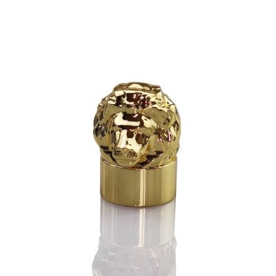 China Gold Decorative Zinc Alloy Lion Head Perfume Bottle Cap For Cologne Package for sale