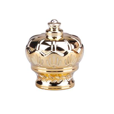 China Customized Exquisite Gold Beautiful Pattern Perfume Bottle Zamac Crown Perfume Cap For Glass for sale