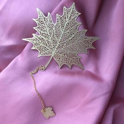 China China High Quality Brass Hollow Out Golden Maple Leaf Metal Locator With Tassels for sale