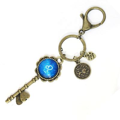 China SC Environmental Friendly Hot Luminous Gold Plated Key Chain New Shape Starry Sky Time Gemstone Key Chain Handmade Gift Twelve Zodiac Sign Key Chain for sale